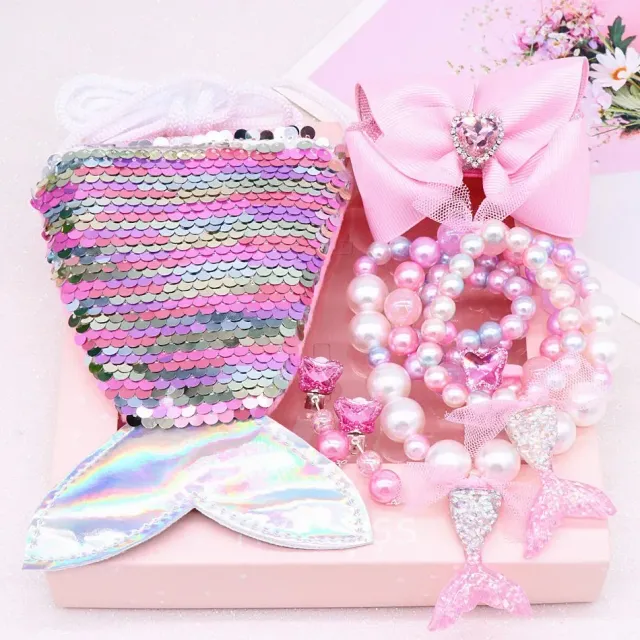 Little girl's slippery purse shaped like a mermaid and pearl accessories