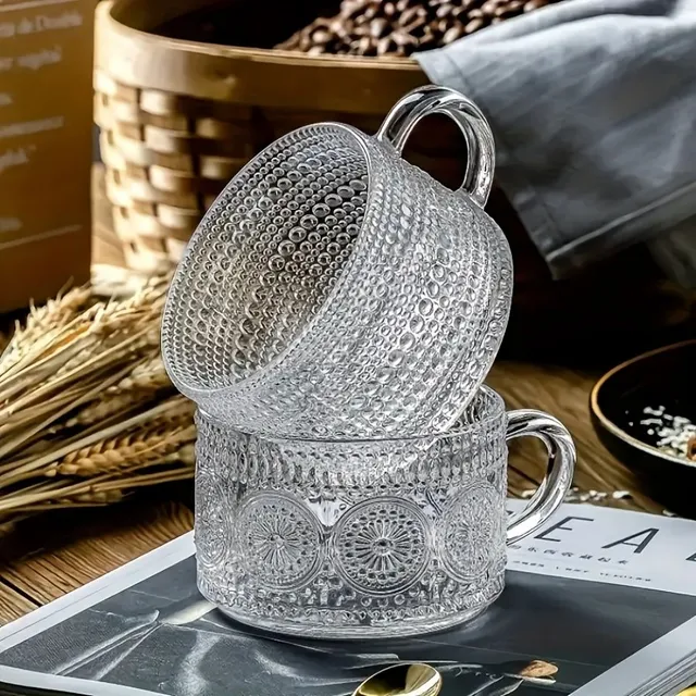 Elegant glass coffee mug with relief for stylish coffee, tea and other drinks