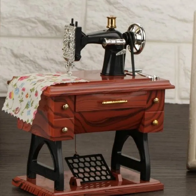 Music box in sewing machine style