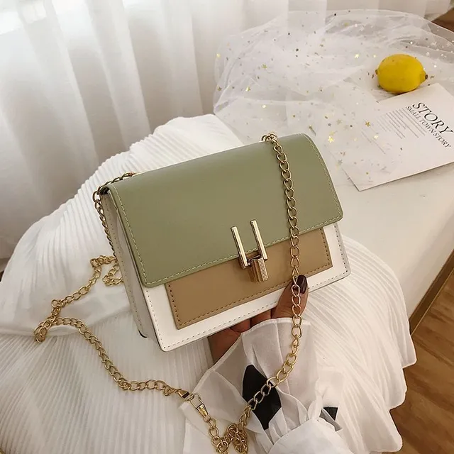 Small leather crossbody bag with gold chain