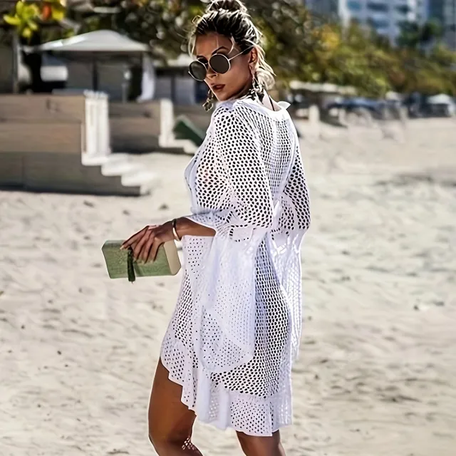 Knitted beach dress with V neckline and long sleeves