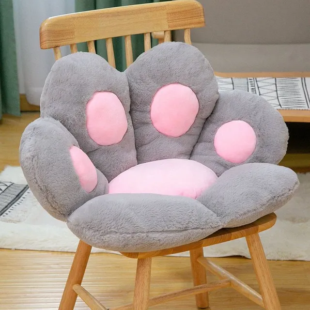 Cute plush armchair in the shape of a bear paw