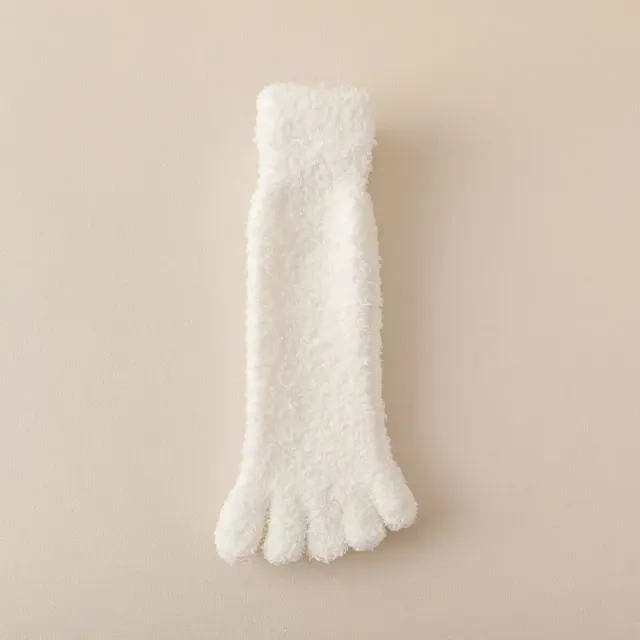 Women's winter socks made of coral fleece with separate fingers at home