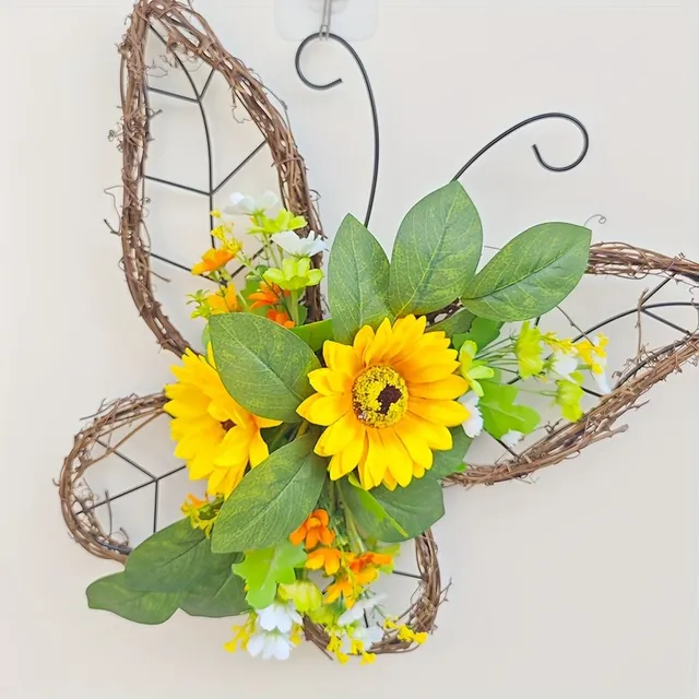 Spring wreath with butterflies and sunflowers on the door