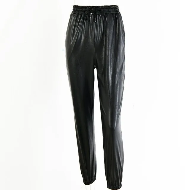 Women's luxurious leather trousers with high waist and strings