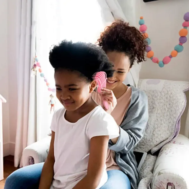 Brosse démêlante avec massage du cuir chevelu pour cheveux bouclés