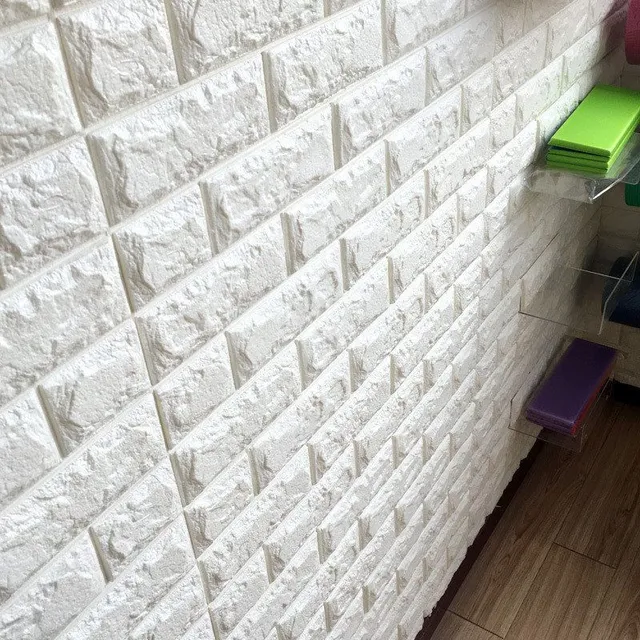 3D self-adhesive wallpaper on the wall