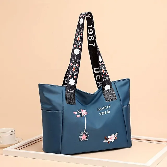 Women's fashion shoulder bag with simple flower print