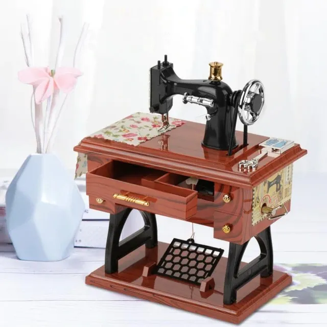 Music box in sewing machine style