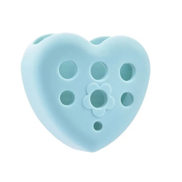 Silicone heart for brush cleaning