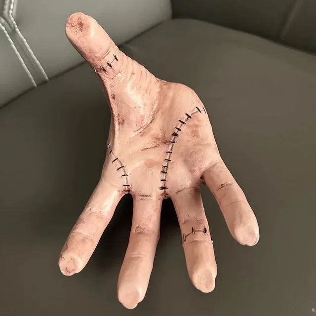 Stylish latex decoration in the shape of a hand from the popular series Wednesday