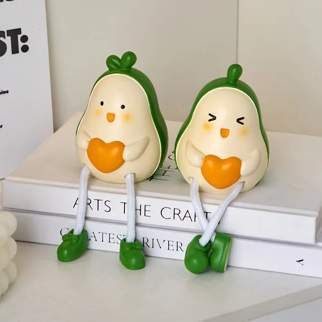 Decorative pair of avocado dolls made from resin