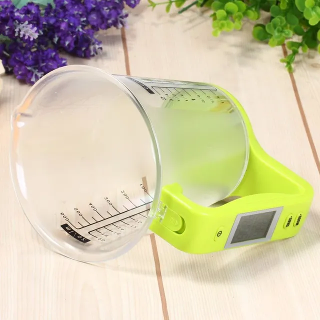 Kitchen scale with measuring cup