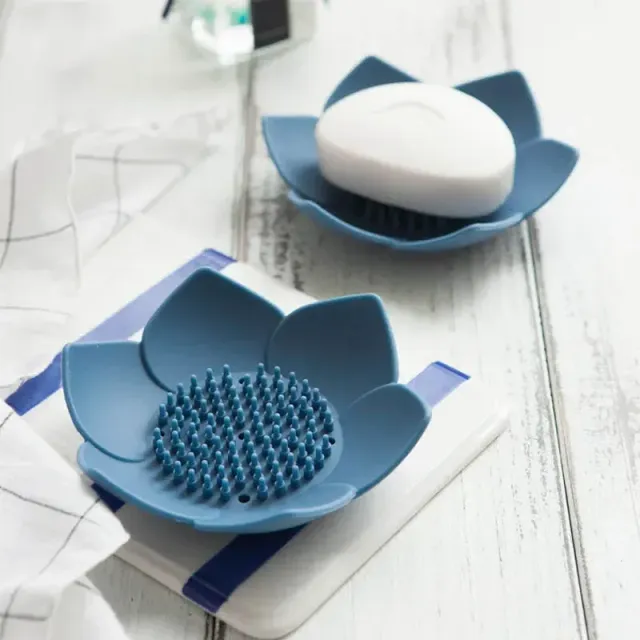 Soap silicone tray in the shape of a lotus with draining into the bathroom