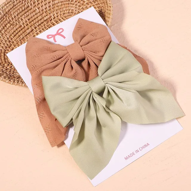 Cute modern baby hair clip with perfect bow motif - more variants