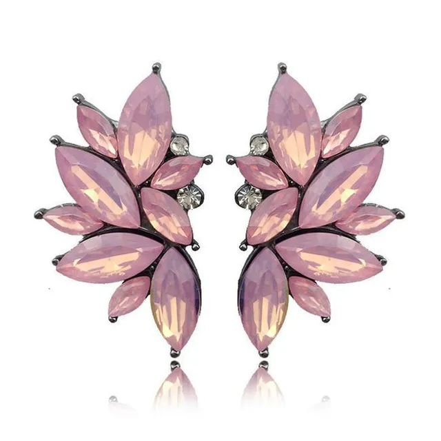 Extravagant shiny earrings with rhinestones