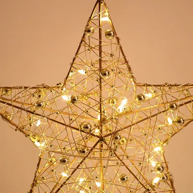 LED Christmas star on top of tree with pearl wire