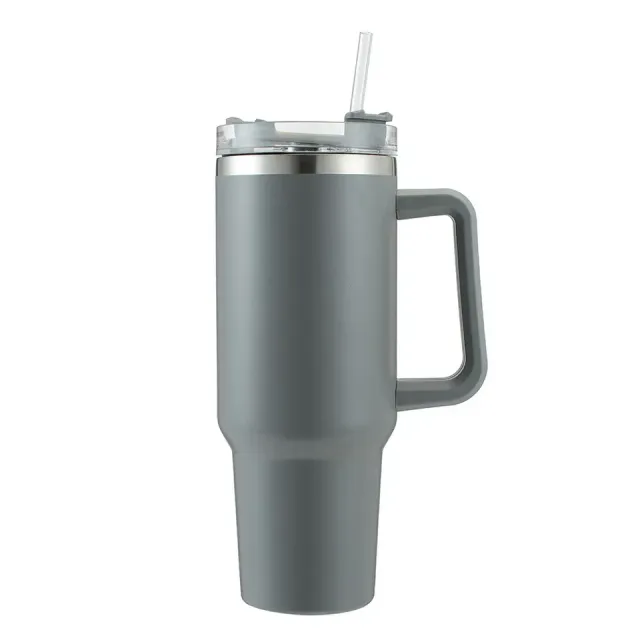 Isolated coffee cup with straw and handle for travel