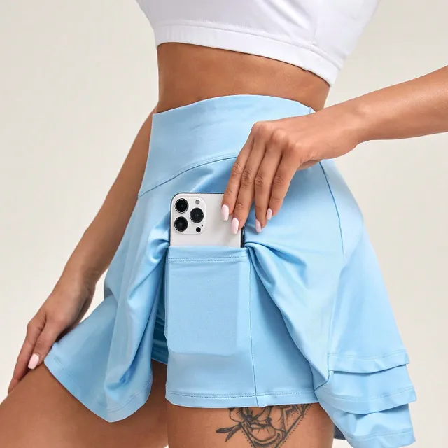 Tennis skirt with a wide ribbon in the waist and a volley line for active movement