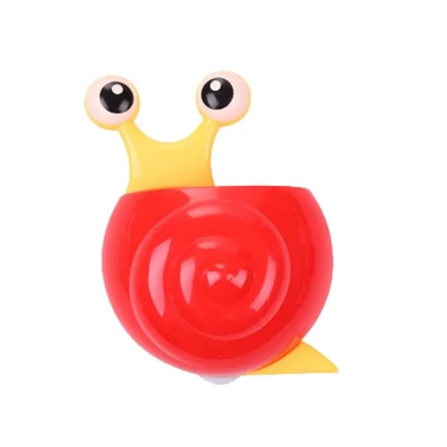 Cheerful toothbrush holder in the shape of a snail