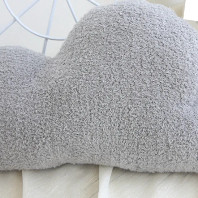 Baby pillow in the shape of a cloud