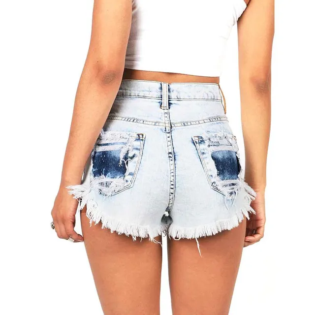 Women's frayed denim shorts with holes in their pockets