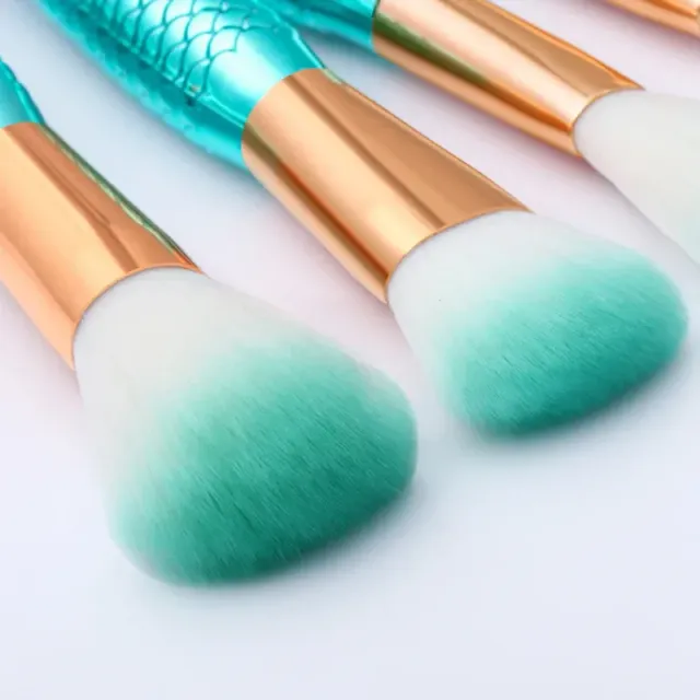 Luxury set of cosmetic brushes - trendy design in mermaid style, metallic color