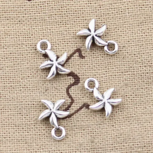 50 pcs double-sided cute pendants in the shape of sea stars with a size of 11x8 mm in the color of old silver