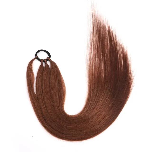 Synthetic hair strands to thicken or lengthen the hairstyle