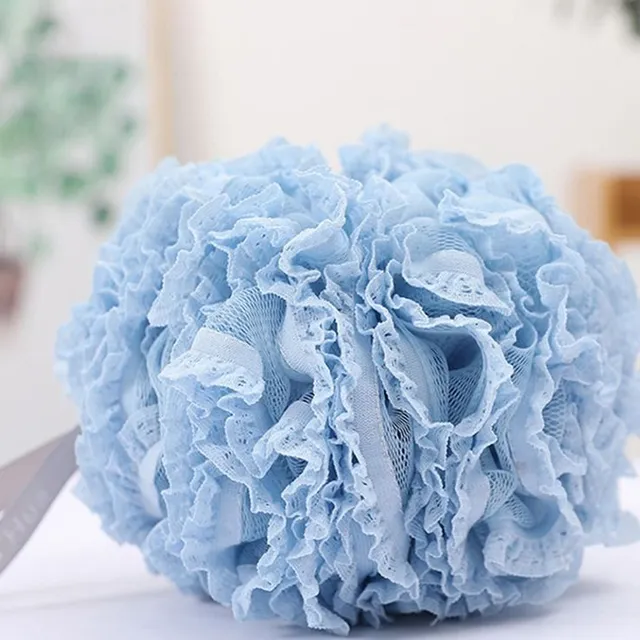 Stylish washing sponge made of modern material in a designer look with Gigi lace