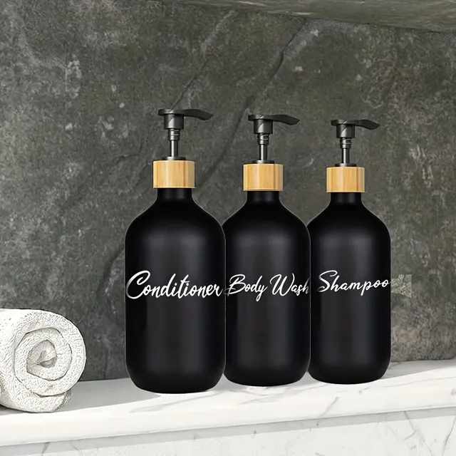 Black dispensers for shower gel, shampoo and conditioner