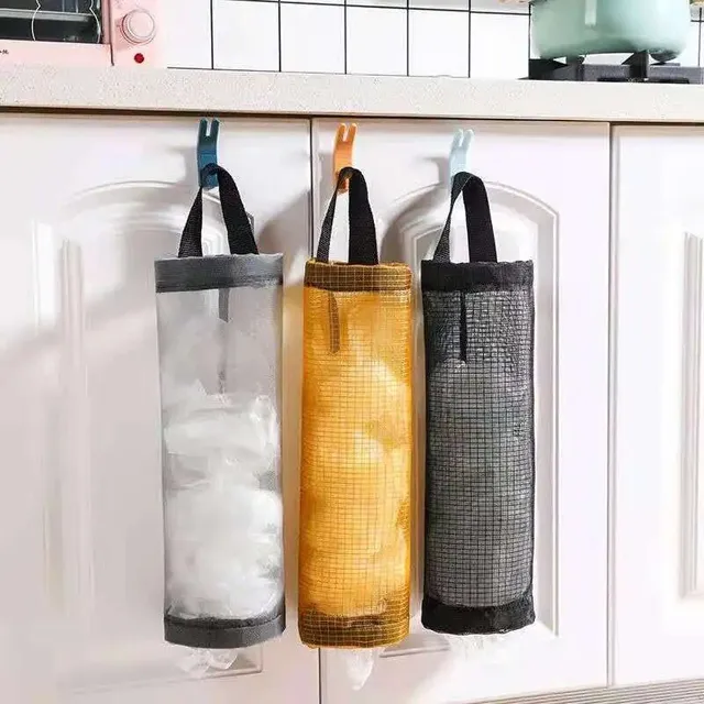 Holder for plastic bags on the wall - magazine and organizer for food bags and trash in the kitchen