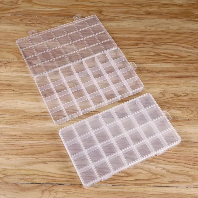 Storage box with 28 transparent plastic compartments