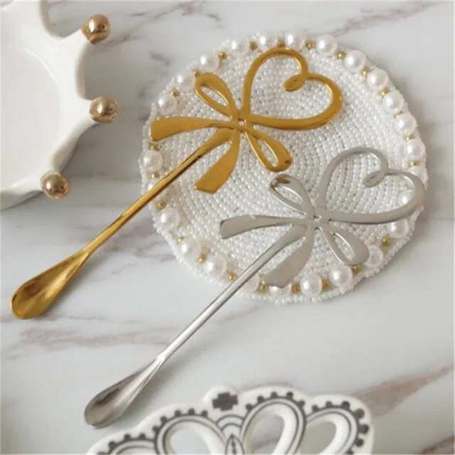 Teaspoon with heart and bow