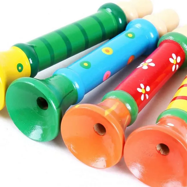 Happy children's wooden whistle