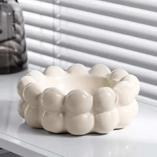 Stylish ceramic ashtray in the shape of a cloud