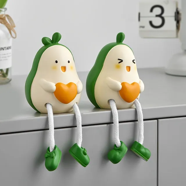 Decorative pair of avocado dolls made from resin