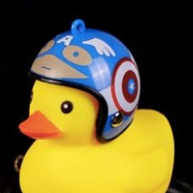 Cute bell for a child's wheel in the form of a duck