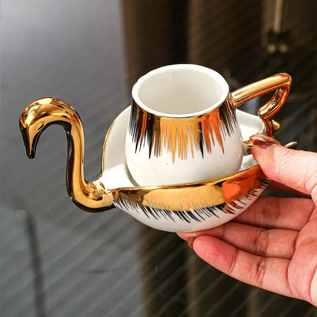 Elegant cup and saucer with swan, ceramic cup for coffee and saucer, drink with golden edge for breakfast, tea party, afternoon tea, home, garden, restaurant and more, drinks for summer and winter