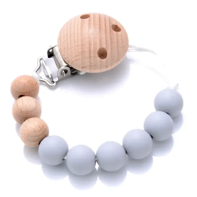 Wooden pacifier clip with silicone bite and round beads