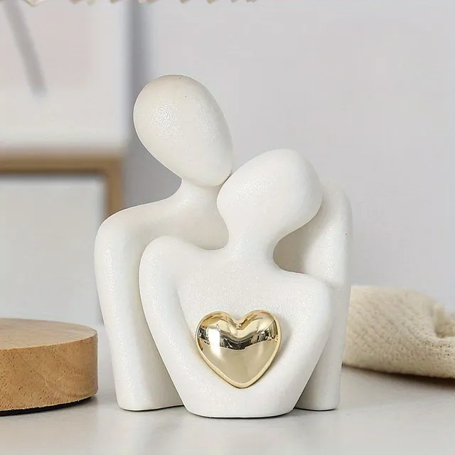 Decorative ceramic figure with motif hug and gold heart