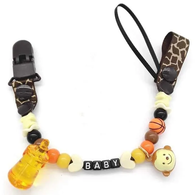 Toy with pacifier necklace © Babysitters