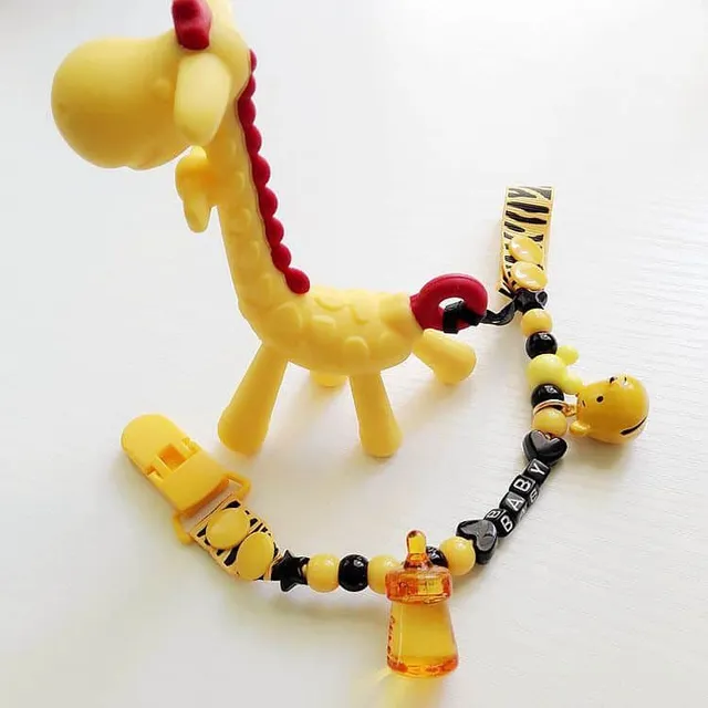 Toy with pacifier necklace © Babysitters