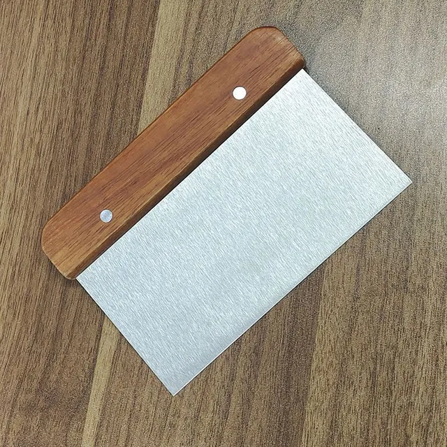 Versatile kitchen helper made of stainless steel - scraper, cutter, cutter