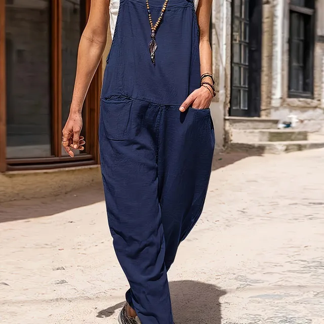 Women's sleeveless jumpsuit with pockets on the front - solid colour