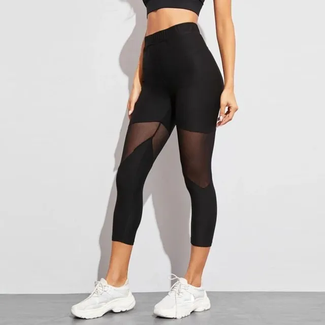 Women's modern trendy sports elastic leggings with meshed detail on their pants