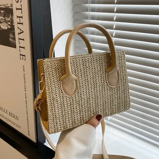 Ladies square beach bag made of rattan with top handle