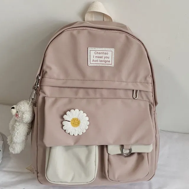 Women's backpack with teddy bear pendant