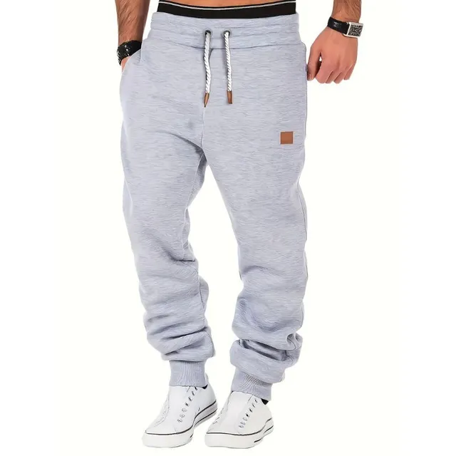 Men's sweatpants with drawstring, pockets and jogger cut for autumn/winter - for running and jogging