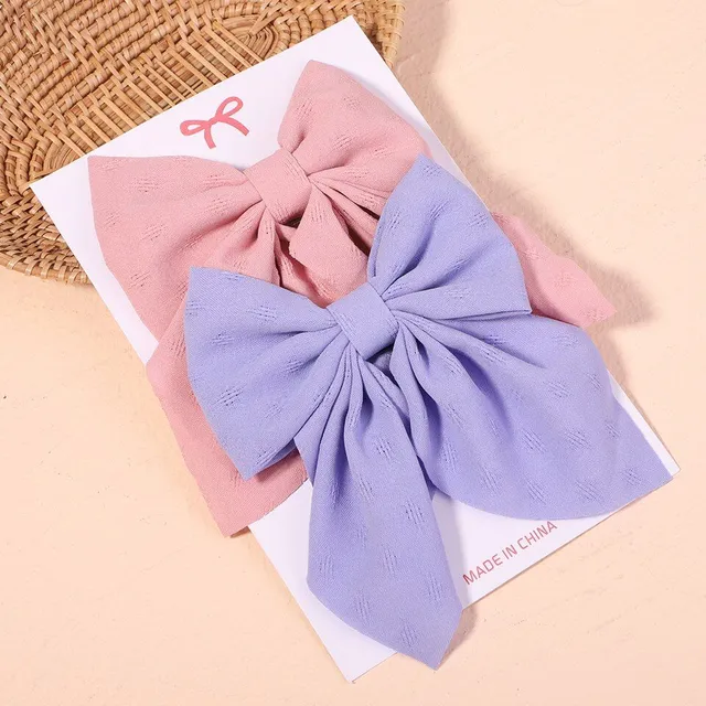 Cute modern baby hair clip with perfect bow motif - more variants